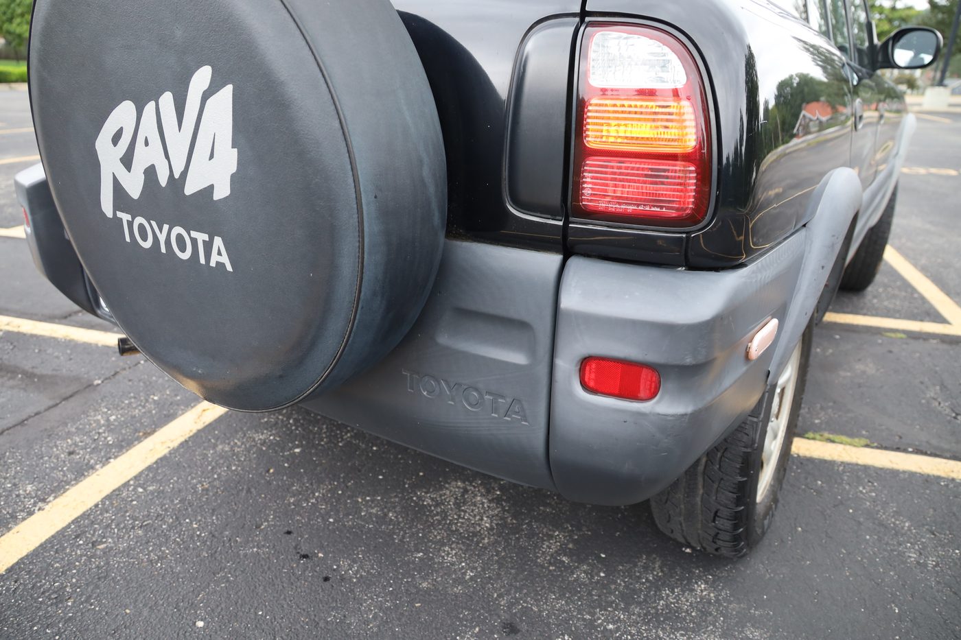 Rear-mounted spare tire with RAV4 cover